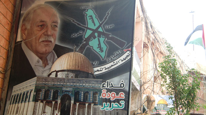 The poster with Ahmad Djibril's portrait in the Palestinian camp