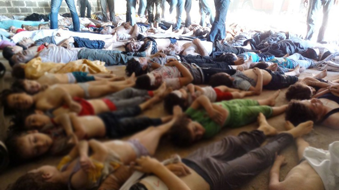 A handout image released by the Syrian opposition's Shaam News Network shows bodies of children and adults laying on the ground as Syrian rebels claim they were killed in a toxic gas attack by pro-government forces in eastern Ghouta, on the outskirts of Damascus on August 21, 2013. (AFP Photo)