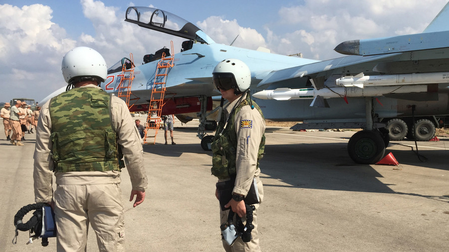 Russian pilots prepared to board the SU-30 attack plane to take off from the Hmeimim aerodrome in Syria. © Dmitriy Vinogradov / RIA Novosti