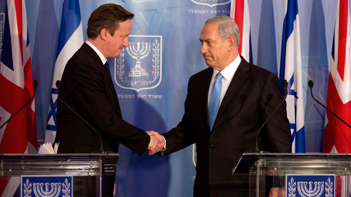 British Prime Minister David Cameron shakes hands with his Israeli counterpart and fellow war criminal Benjamin Netanyahu