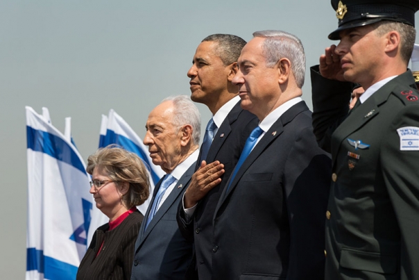 President Barack Obama stands with Israeli President Shimon Peres and Prime Minister Benjamin Netanyahu during the President’s official arrival ceremony in Tel Aviv, Israel, in 2013. (Official White House Photo by Pete Souza)