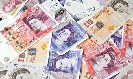 Paper notes and metal coins make up just 3% of all the money in the UK. The remaining 97% consists of numbers in banks' computer systems. Photograph: Hire Image Picture Library/Alamy